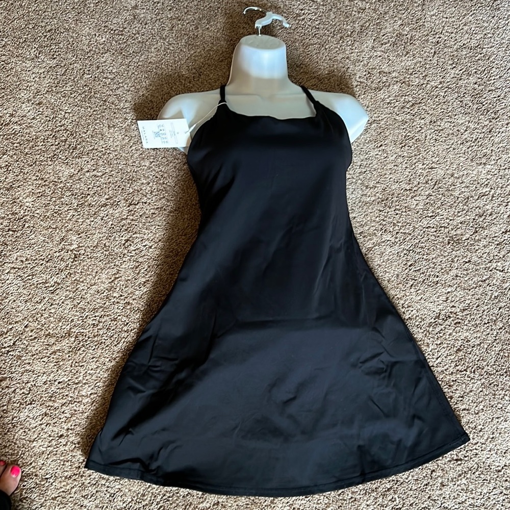 HALARA one piece bathing suit/ romper. Brand new!